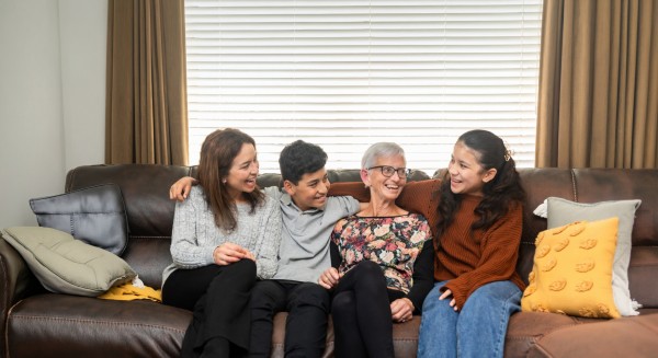 Intergenerational family of people from each life stage