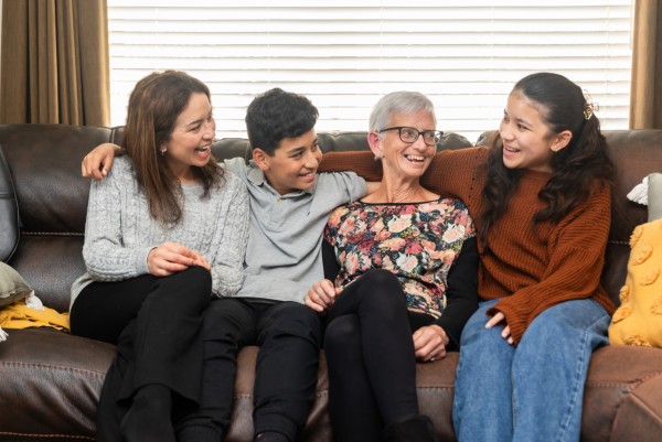 Intergenerational family of people from each life stage